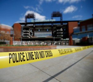 There are over 18,000 police agencies in America, and most of them do a poor job communicating and sharing information. (AP Photo/Matt Slocum)